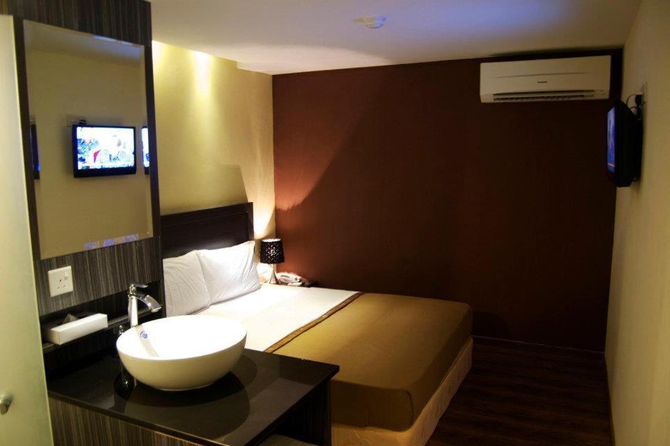 Zotel Business & Leisure Hotel Kuching Habitación foto
